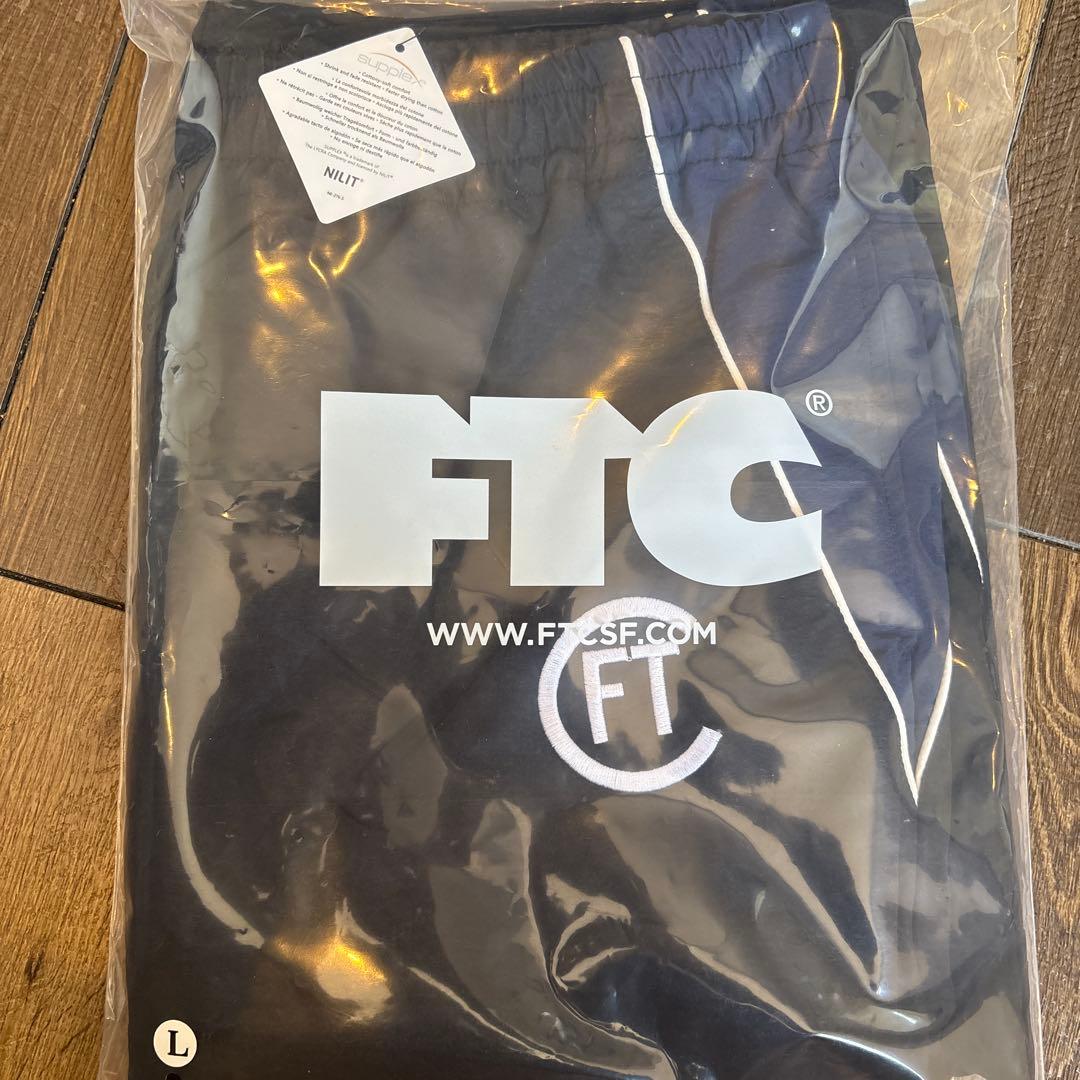 FTC ナイロントラックパンツ (L)