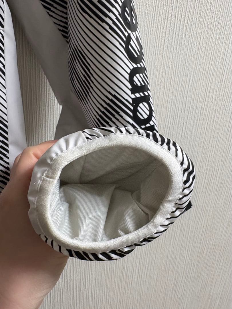 New Balanceストライプジャケット フード付き