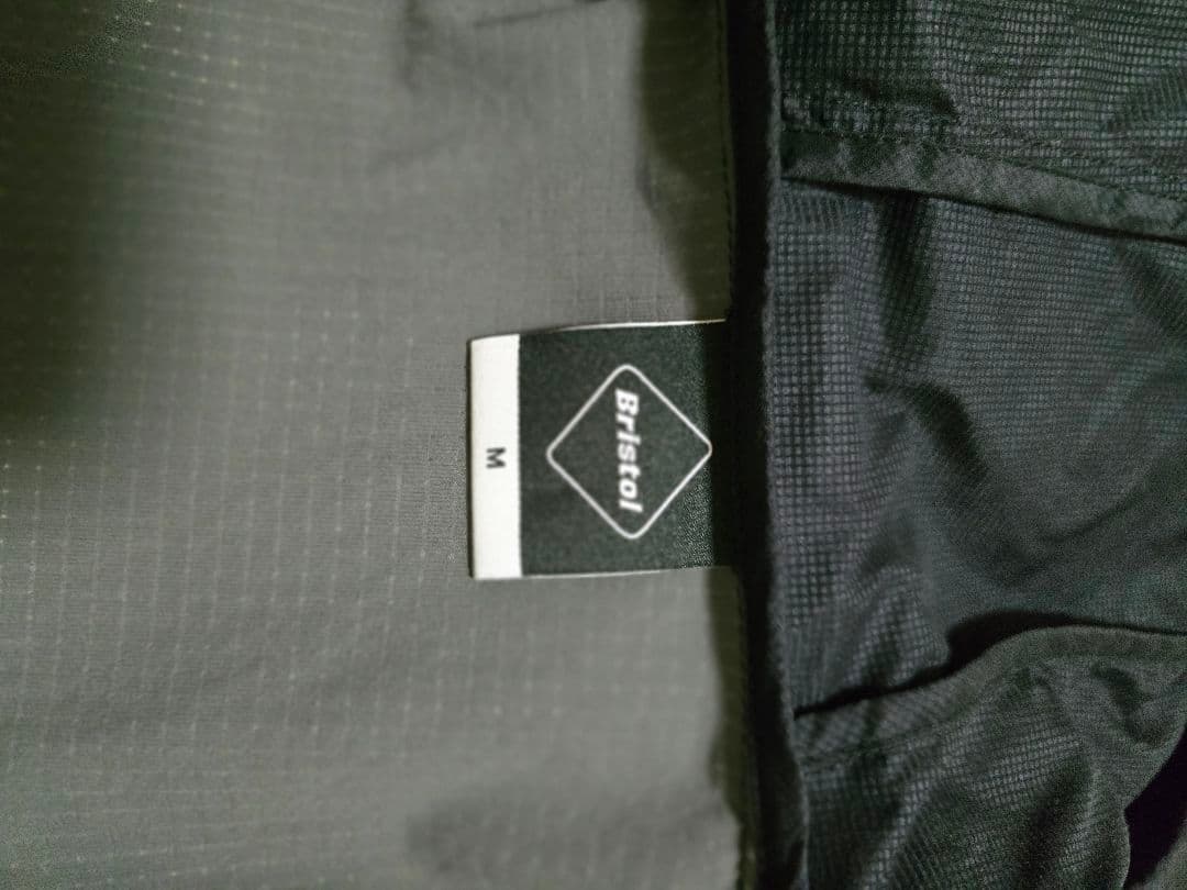 FCRBBristolナイロンジャケット黒/グレー