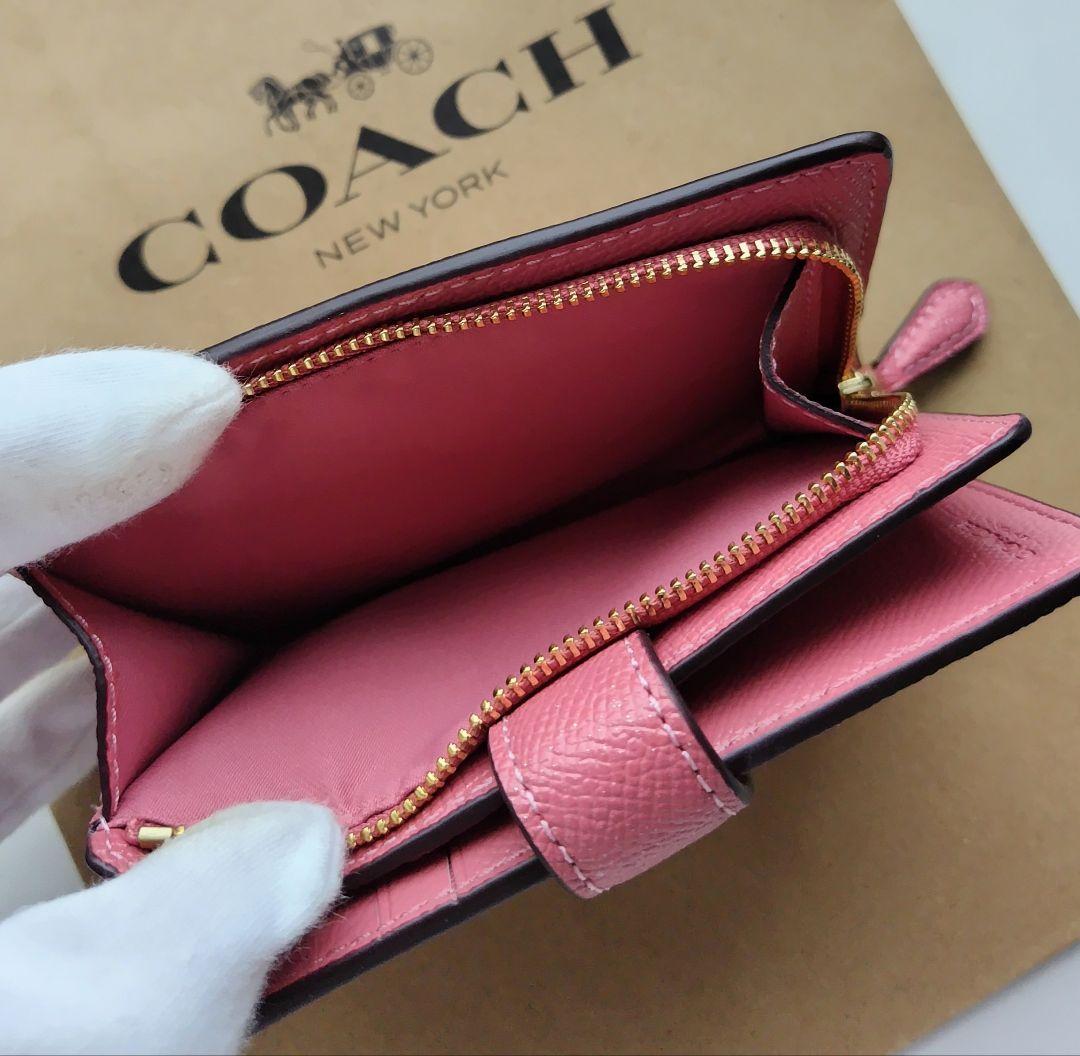 【新品】COACH コーチ 二つ折り財布 シグネチャー ピンク　レザー