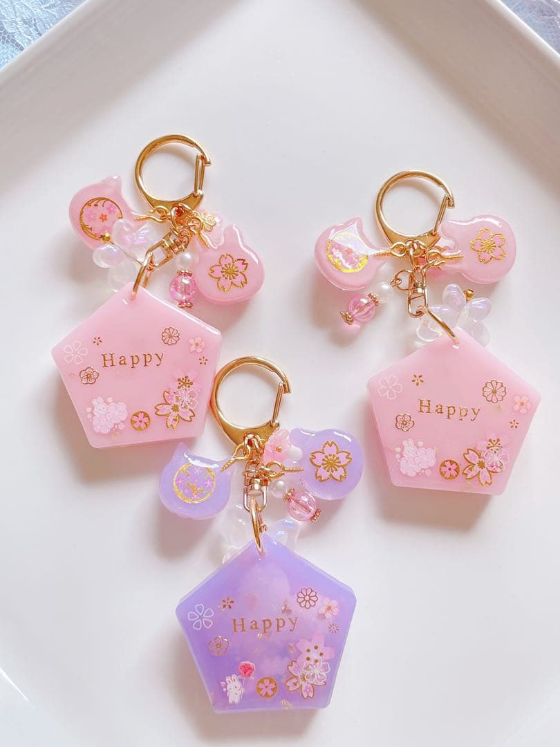 シャカシャカキーホルダー　桜の御守りシェイカー　だるま付き　ひなページ