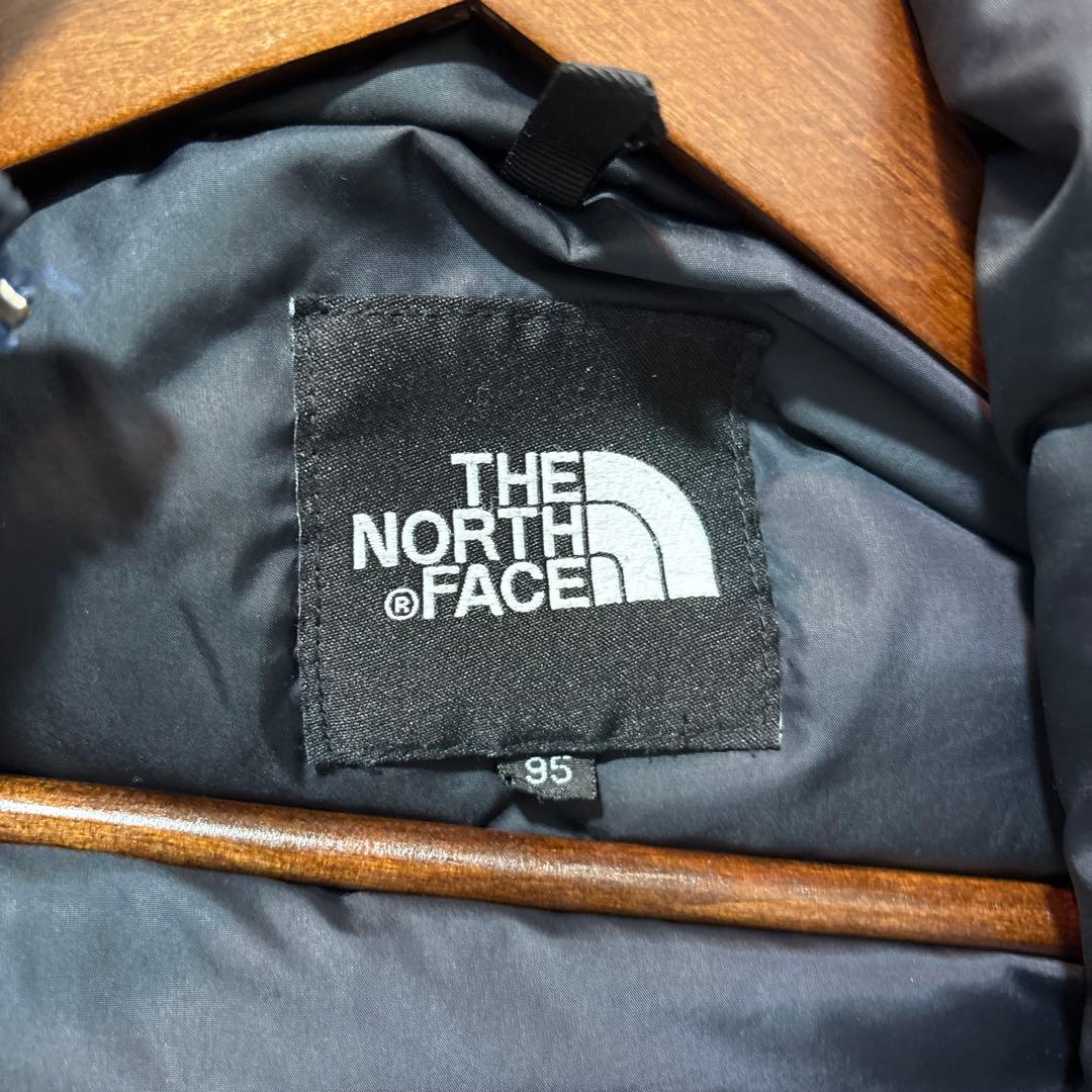 ノースフェイスヌプシダウンベスト700フィル刺繍口ゴドローコード