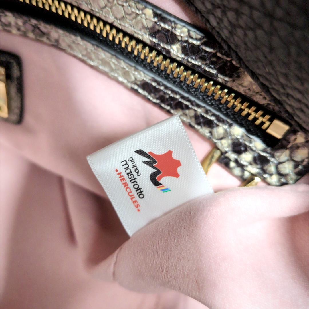 ★ココセリュックスゴールド 2WAY シボ革 バッグ スマホケース付 黒赤 新同