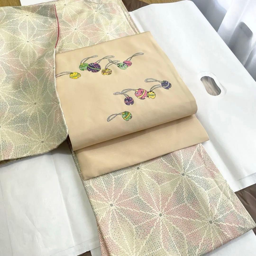 未使用　大島紬　袷仕立て　パステルカラー　名古屋帯（長尺）付き