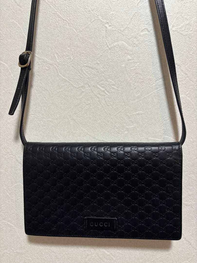 GUCCI ブラック レザー ウォレットバッグ（男女共用）