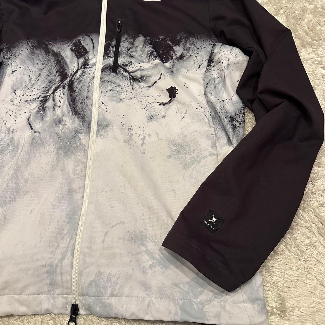 特大　オークリー　ジャケット　ナイロン　総柄　メンズ　サイズXL スカル　ロゴ