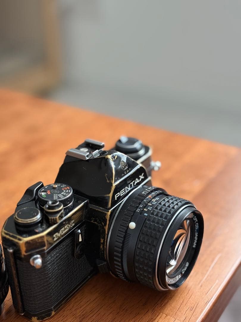 PENTAX MX SMC PENTAX-M 50mm f/1.4レンズ付き。