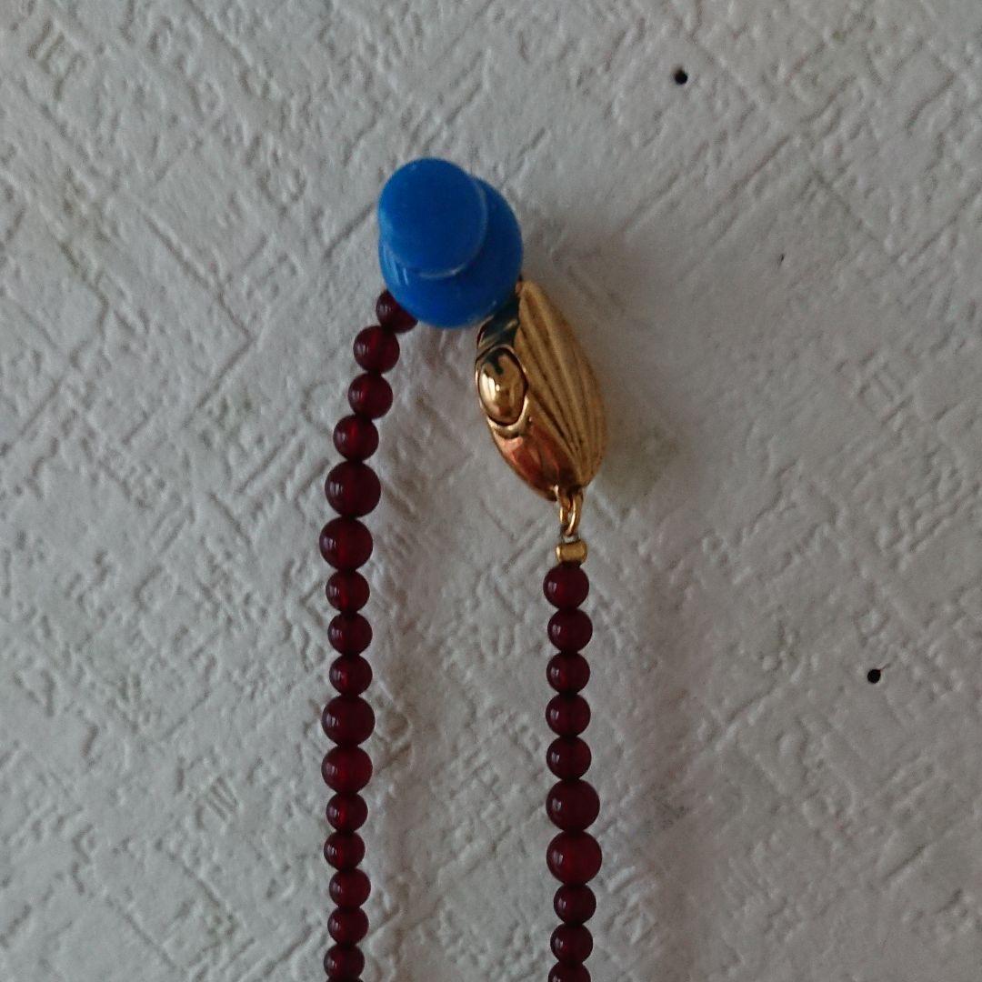 琥珀のネックレスに猫が描いている可愛いネックレス留め金はシルバー新品で非売品です