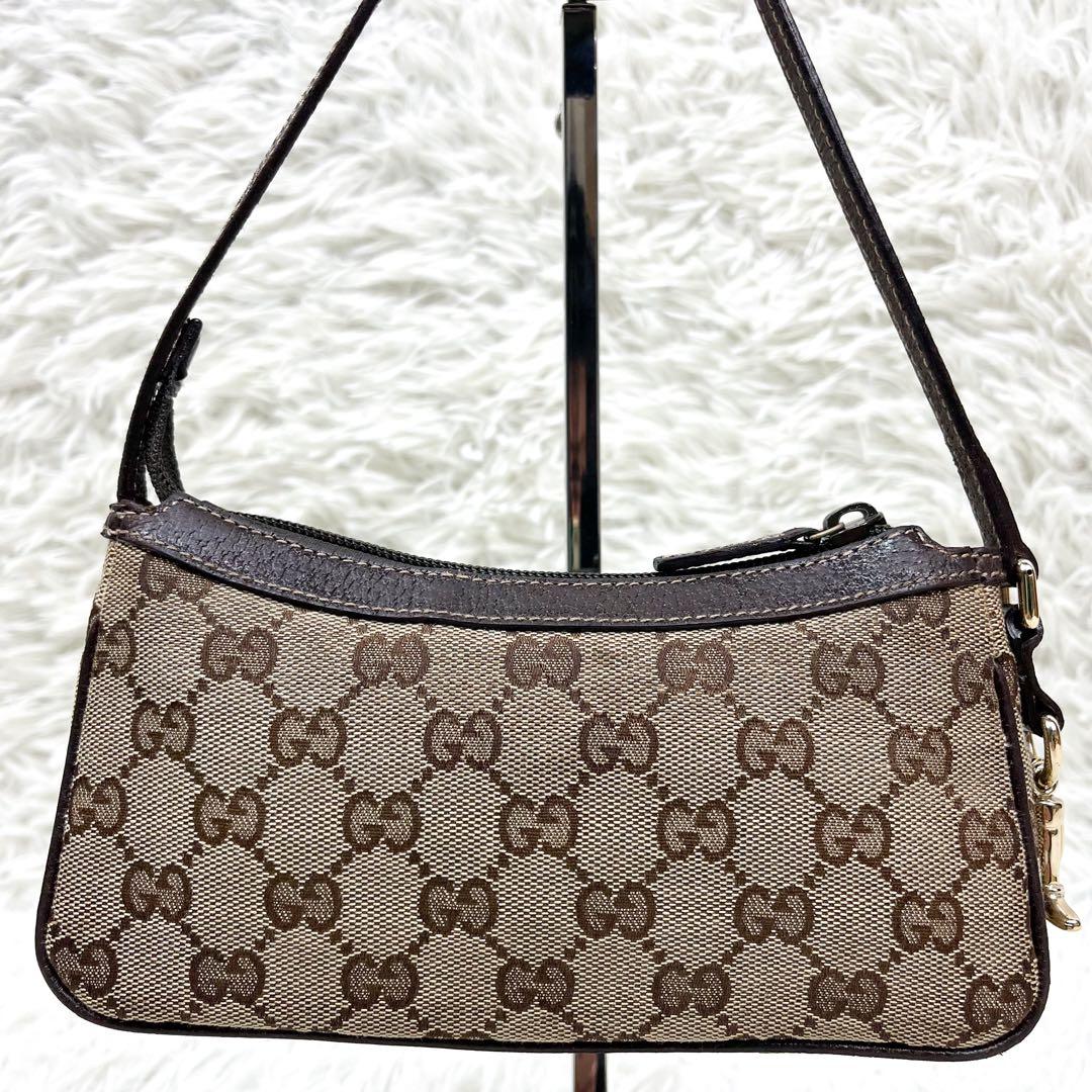 希少 グッチ アクセサリーポーチ ブーツチャーム GGキャンバス レザー