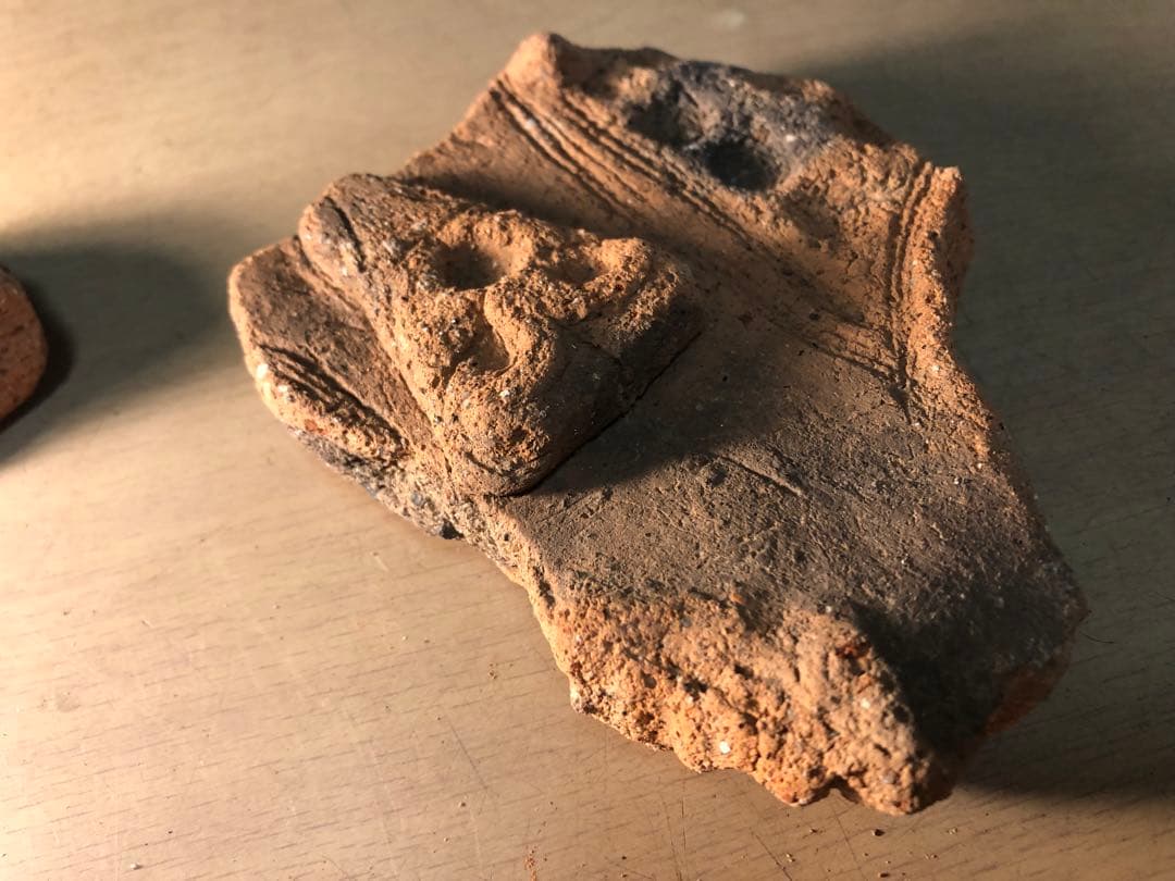 「板状土偶の破片」です。