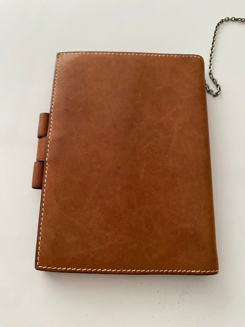 エルメス茶色い革手帳ボールペン付き