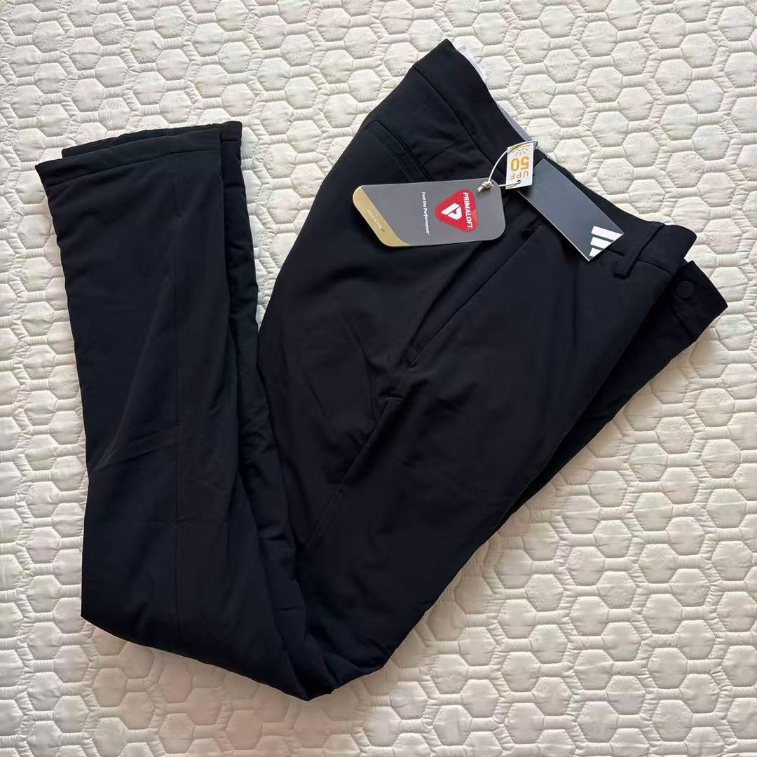 76新品27500円アディダスゴルフ/メンズ/秋冬/中綿ストレッチパンツ/黒