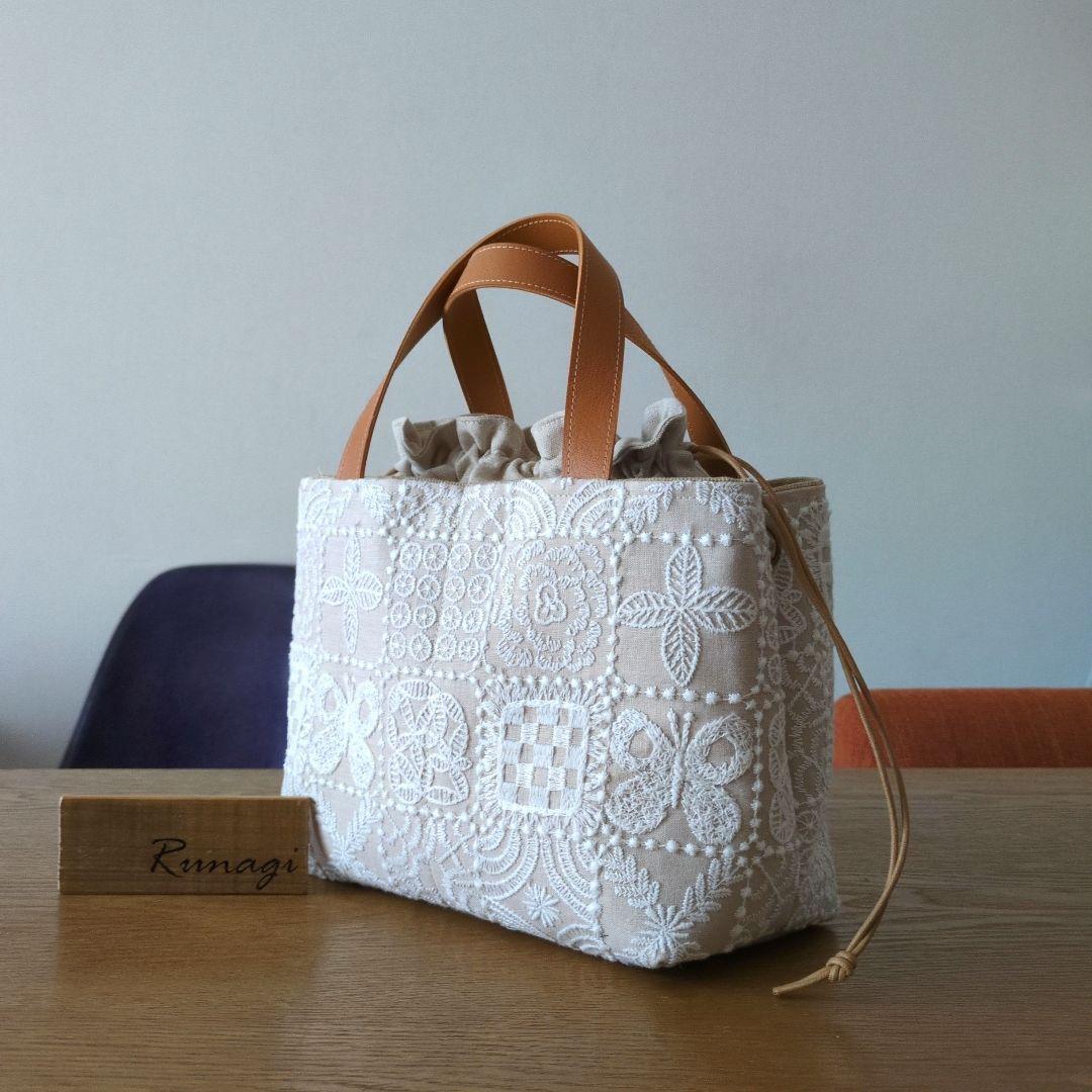 【1560】あおりポケットの巾着バッグ＊ミナペルホネン