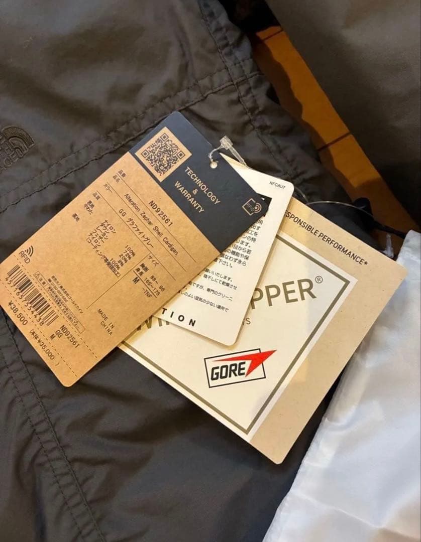 THE NORTH FACEオルタレーションゼファーシェルダウン ND92561