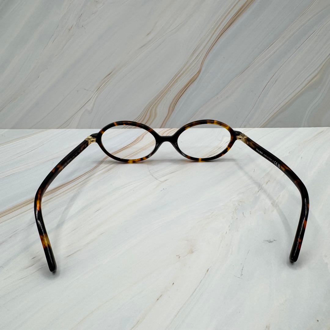 【ミュウミュウ】ウォニョン着用　 レンズなし　伊達メガネ べっこう柄　ロゴ