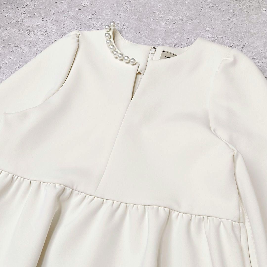 UNITED ARROWS SPONGY パールモチーフペプラムブラウス　38