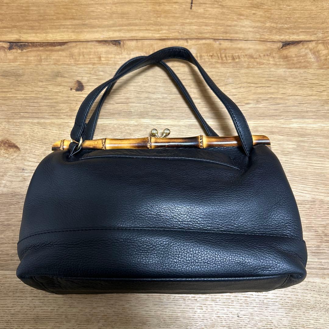 シ*ュ様 新品未使用　POMTATA 牛革　ハンドバッグがま口スコットクラブ系