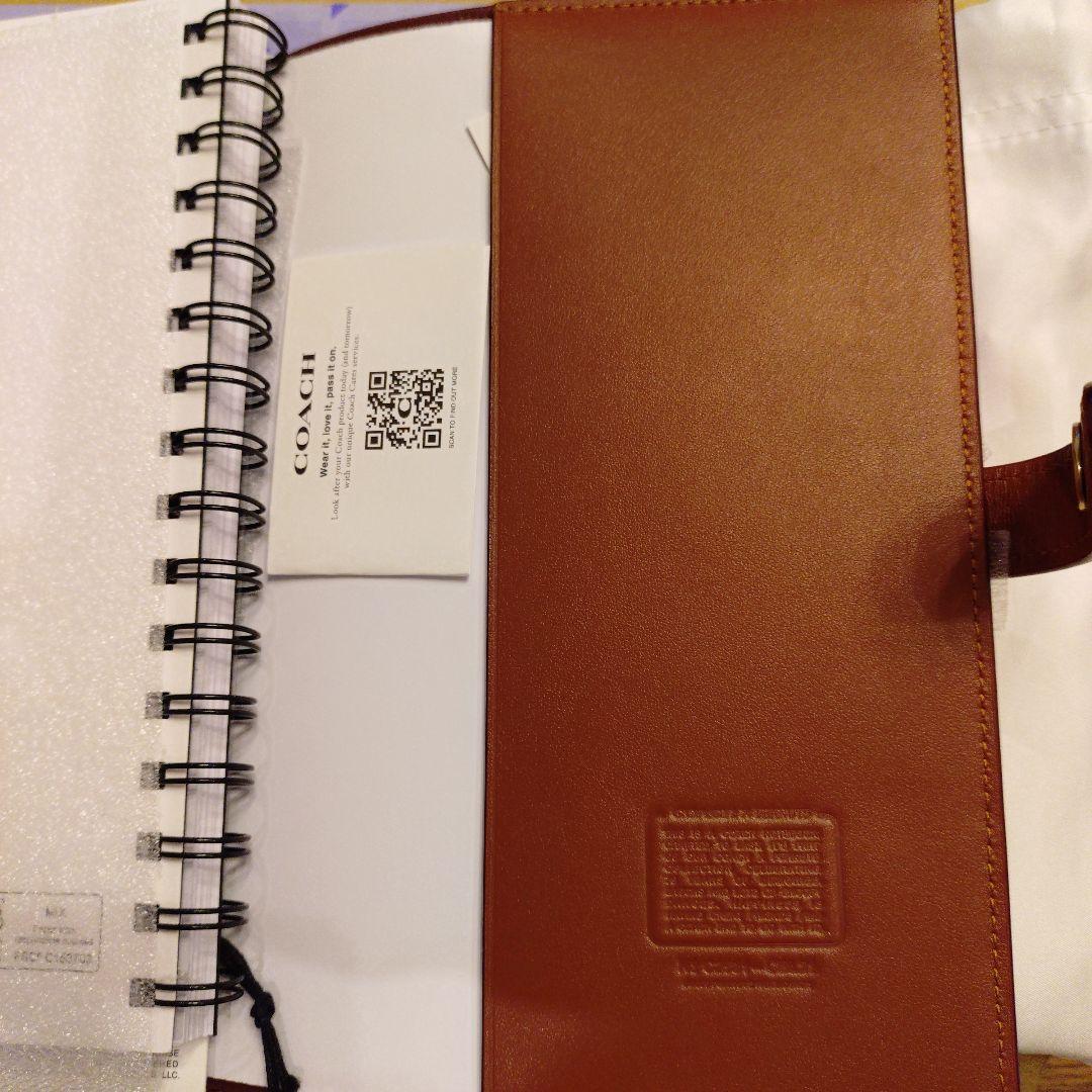 コーチ　スヌーピーコラボ　ノートブックシグネチャーキャンバス