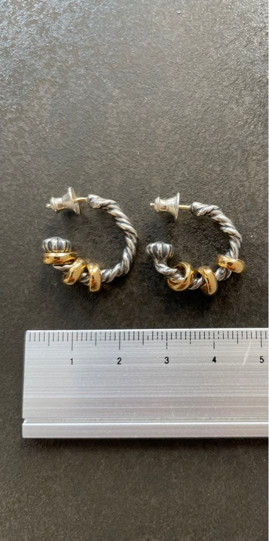 古着arrow Bill Wall Leather /ツイストフープピアス