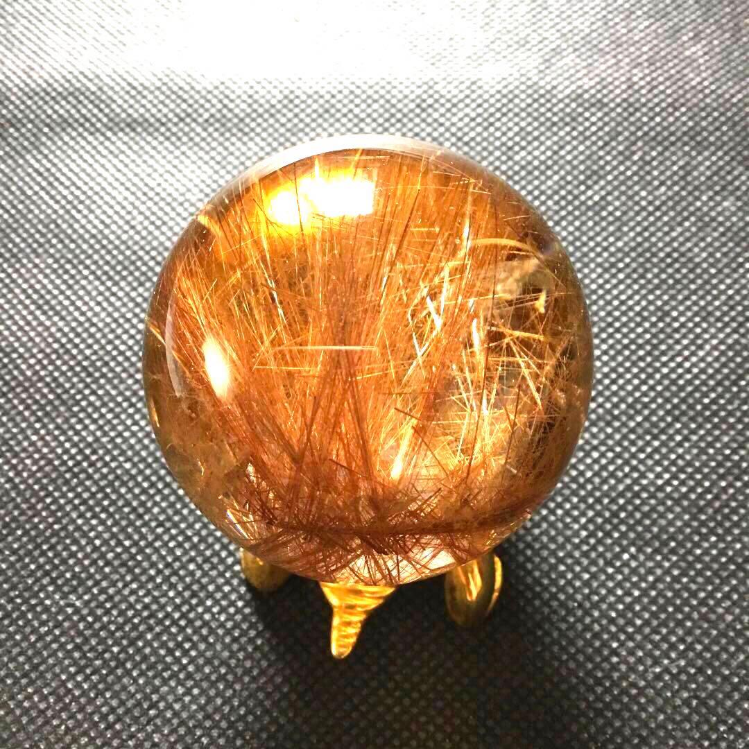 ゴールドルチルクォーツ置物　丸玉　ブラジル産　直経約4.83cm 重さ約160g