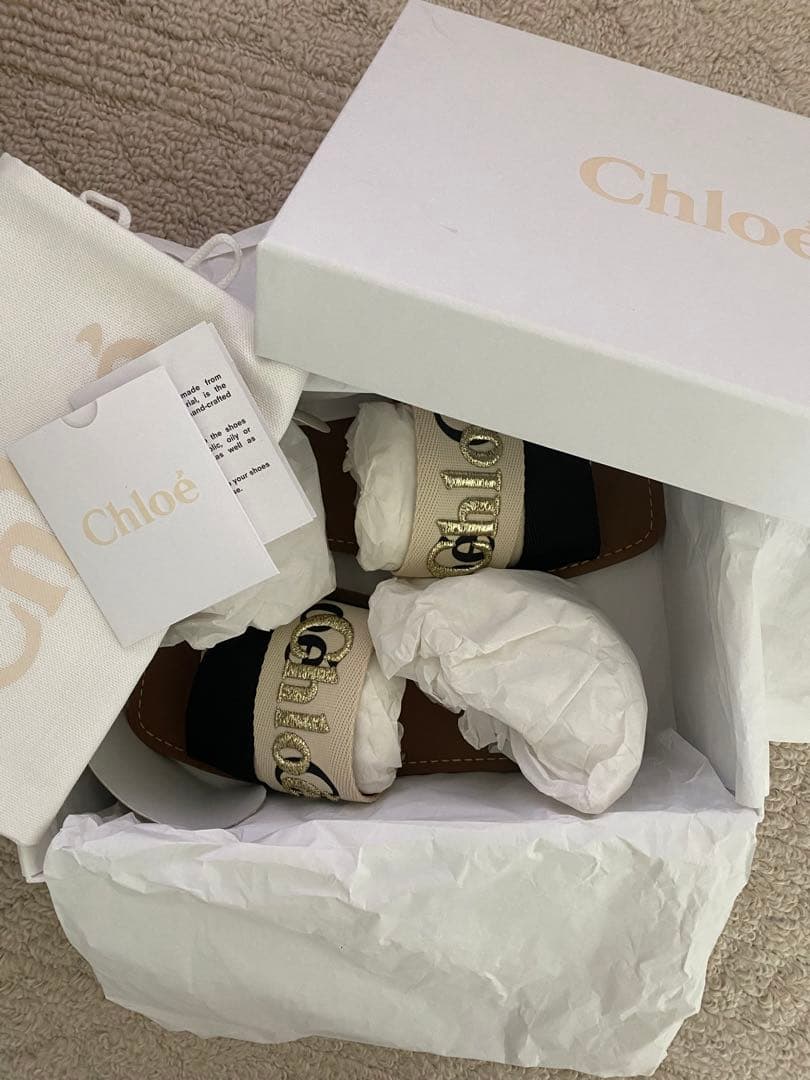 Chloe Woodyフラットサンダル