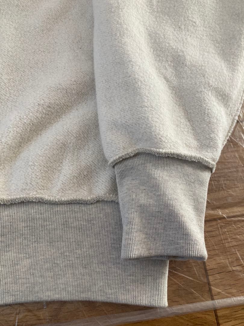 シオタ ハーフジップスウェットシャツ ユニセックス