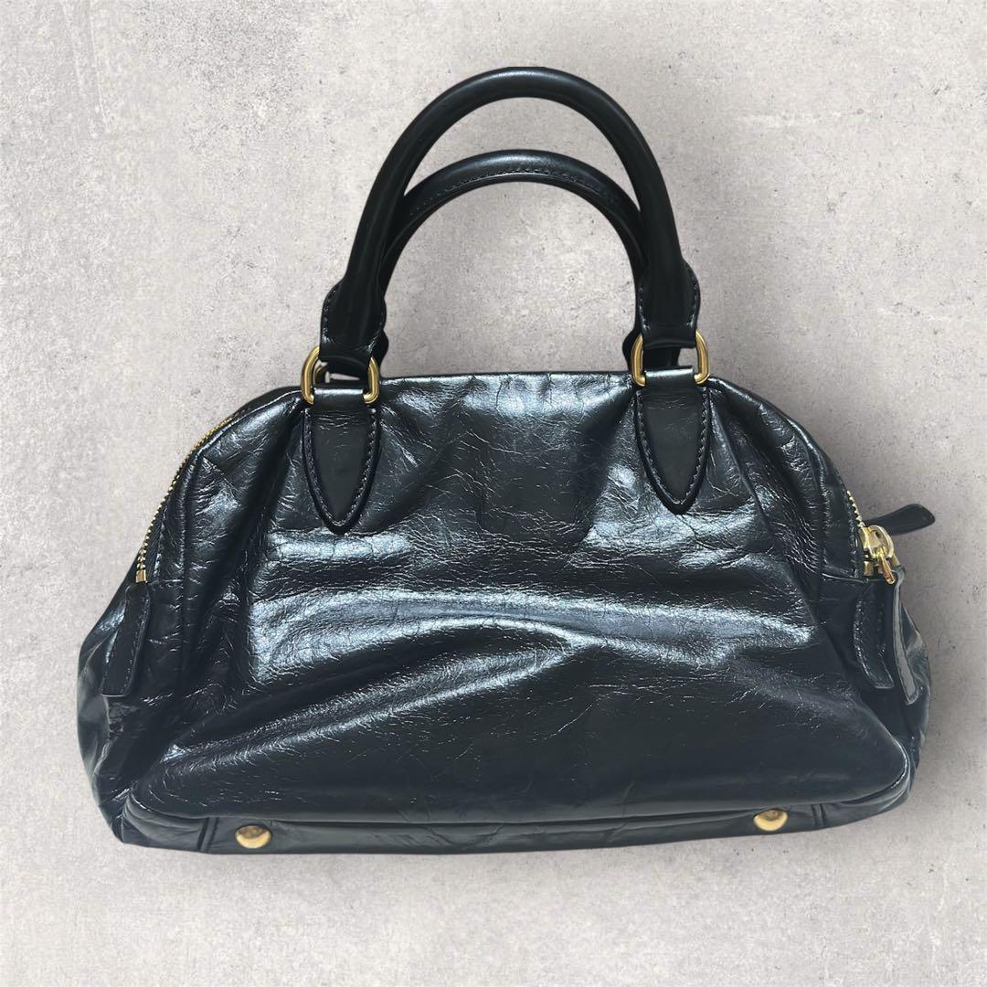 miu miu ブラック　ゴールド　レザー　ハンドバッグ