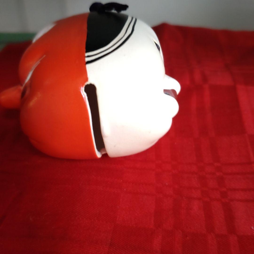 昭和の土鈴伝統的な女面と天狗の二面