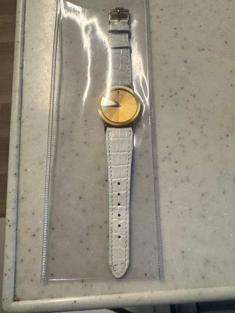 CORUM ゴールド ホワイトレザー 時計　 動きません。金に換算で
