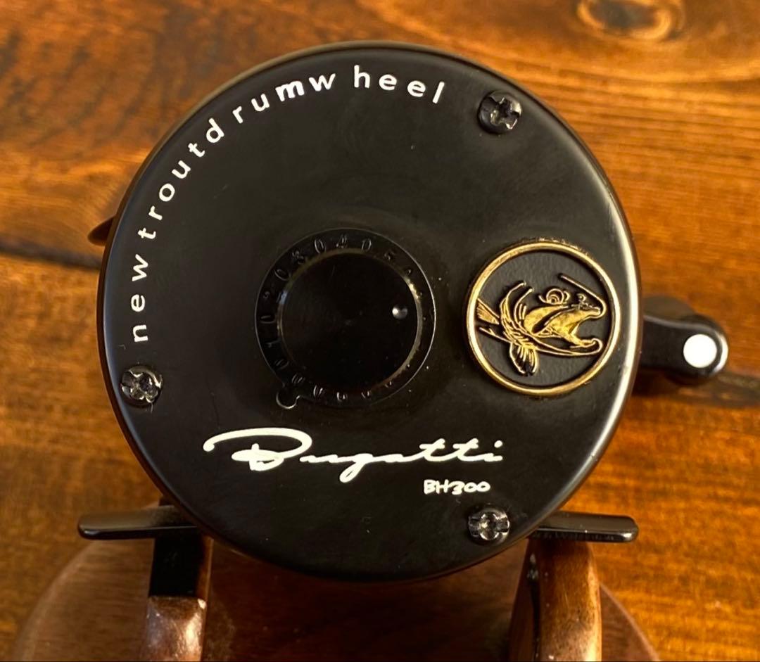 新品未使用　トラウト　ベイトリール　丸型　リール　ブラック×ブラック　渓流釣り