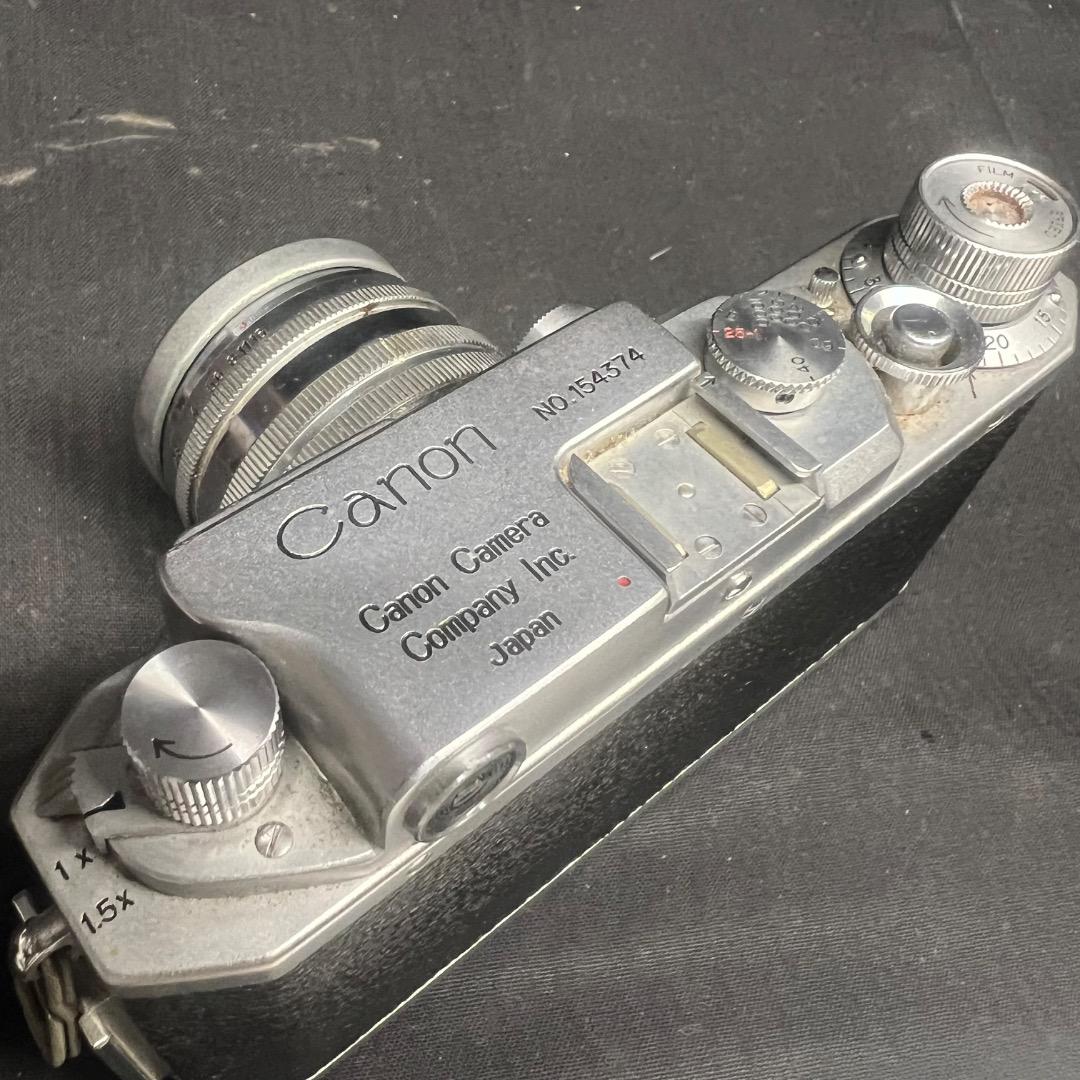 〇Nb右1058 キャノン フィルムカメラ No.154374 レザーケース付