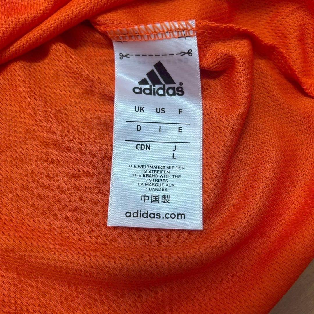 アディダス ユニフォーム オレンジ GIANTSロゴ ボタン付き s6138