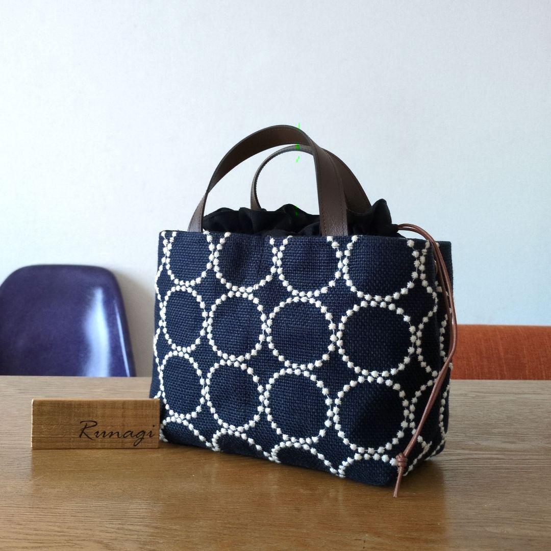 【1549】あおりポケットの巾着バッグ＊ミナペルホネン